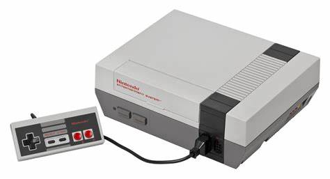 An Image Showing The Nintendo Nes And Its Controller 