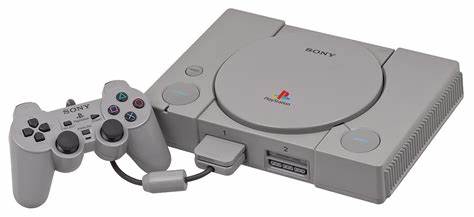 An Image Of The Controller And Console Of The Playstation 1 